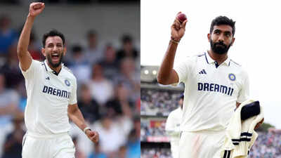 Prasidh Krishna and Jasprit Bumrah in conversation during a training session.