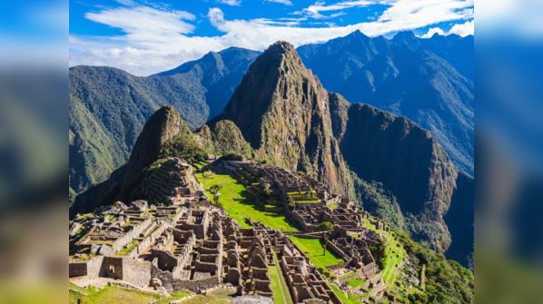 Overview of the ancient city of Machu Picchu nestled in the Andes Mountains